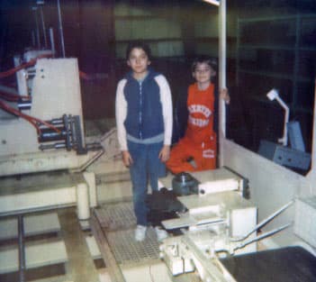 Jeff and John as children at the shop.